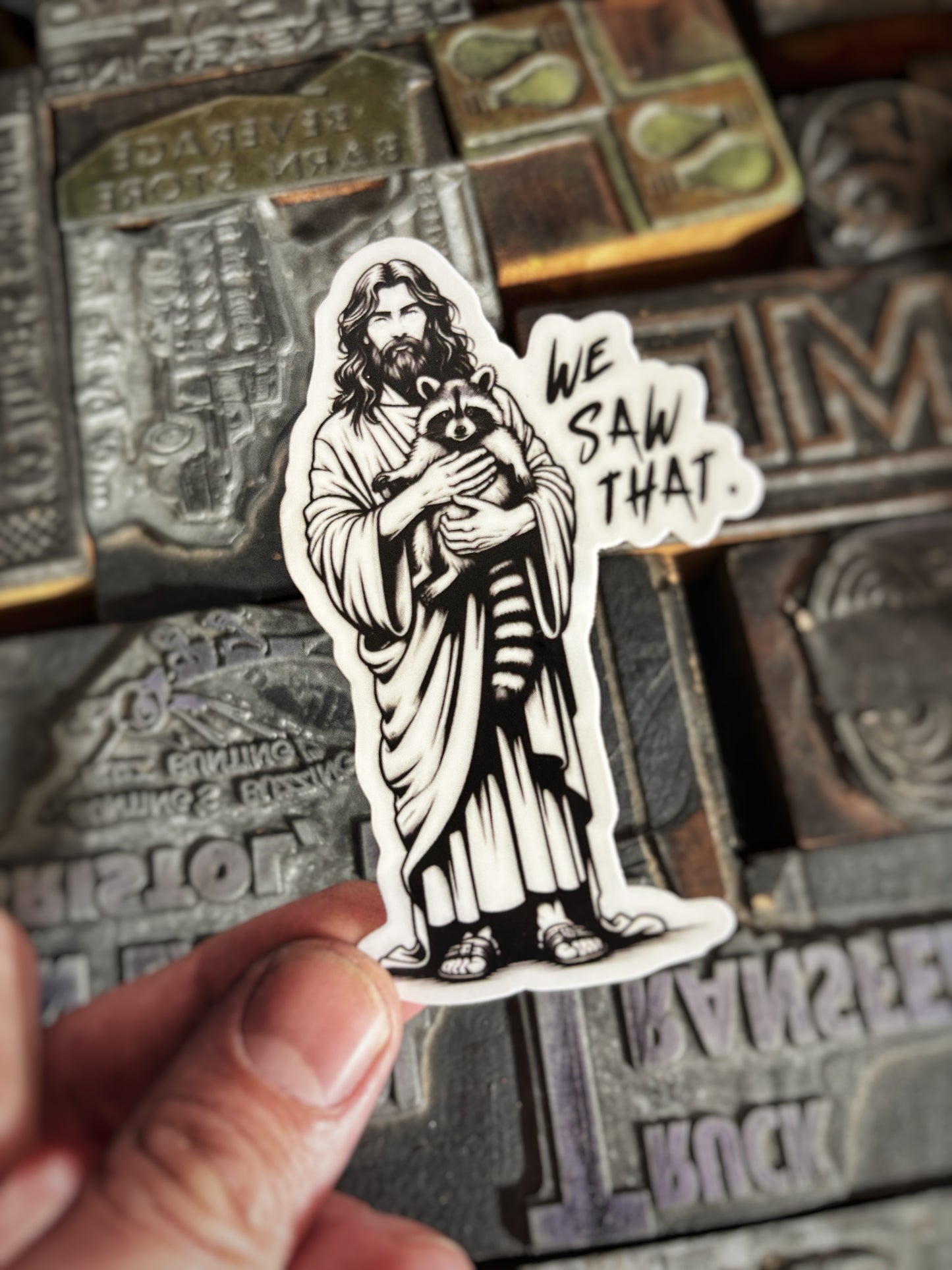Jesus & Raccoon Are Watching Sticker